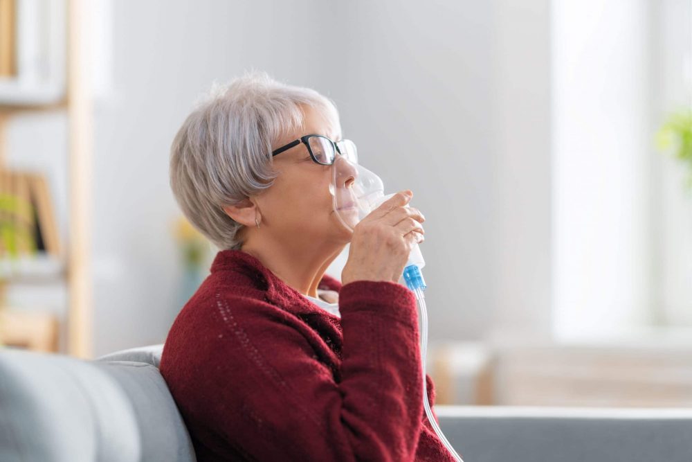 lady with bronchiectasis using nebuliser - DR Ricardo Jose - chest doctor